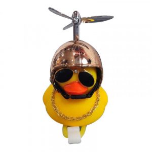 ACOMPAÑANTE VIAJERO PATO AMARILLO CASCO DORADO