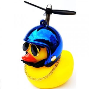 ACOMPANANTE VIAJERO PATO AMARILLO CASCO AZUL